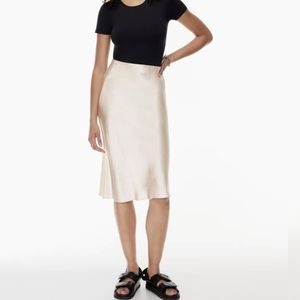 Aritzia babaton satin midi skirt in Denude